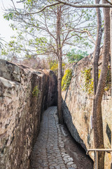 Foot path to mountain cave in temple thailand