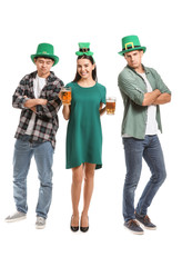 Friends with beer on white background. St. Patrick's Day celebration