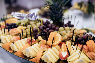 catering food with fresh fruits on wedding reception