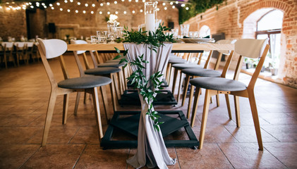 Fototapeta na wymiar elegant table set, tables and chairs in restaurant