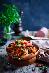 Dominican rice with vegetables and sausages