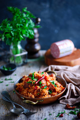 Dominican rice with vegetables and sausages