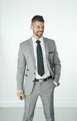 Portrait of happy businessman in suit