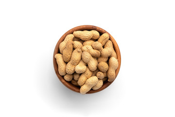 Peanut in the shell in wooden bowl isolated on white background.