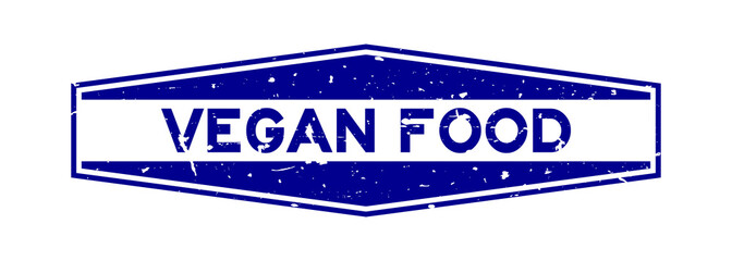 Grunge blue vegan food word hexagon rubber seal stamp on white background