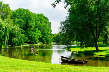 boat in water in Stadspark, public park, Kampen. The Netherlands