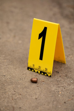 Crime scene with yellow signs.