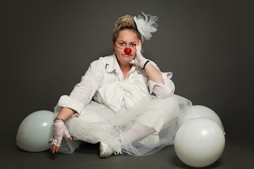 Portrait of woman clown. Performance Actress at work, White Clown Character