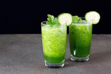 Glass of fresh cucumber juice. Green smoothie. Detox water. Healthy drink.