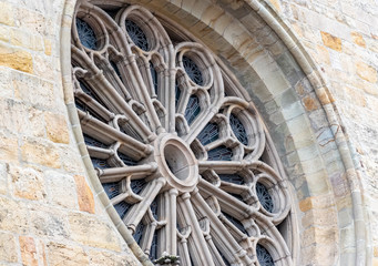 round stained glass window on church in Europe 