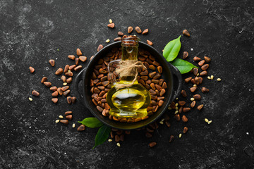 Pine nuts oil and pine nuts. Superfood. free space for your text. Top view.