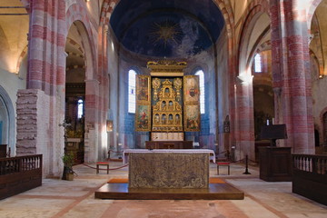 Staffarda, Piedmont, Italy - January 20, 2020: Internal nave and gilded altar of Staffarda Abbey, a Cistercian monastery located near Saluzzo, founded in 1135