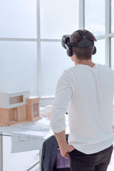 Fototapeta premium close up. modern designer looking at a virtual project.