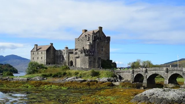 Tourists visiting Eilean Donan Castle in Loch Duich, Ross and Cromarty, Western Highlands of Scotland, UK