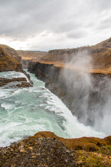Waterfall by the side of a mountain