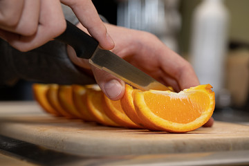 slicing oranges