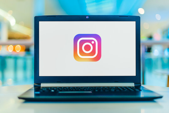 Laptop computer displaying logo of Instagram