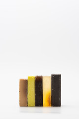 Various seated handmade artisan soaps