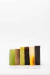 Various seated handmade artisan soaps