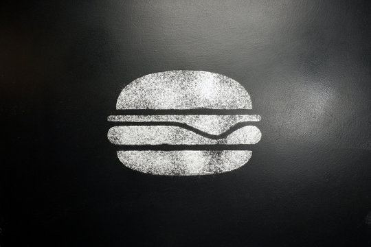 Hamburger. Drawing on a black chalkboard