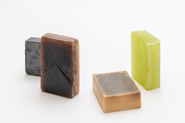 Various seated handmade artisan soaps