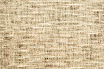 Light brown linen background Weaving Canvas Fabric Texture background. or Natural brown cloth surface .