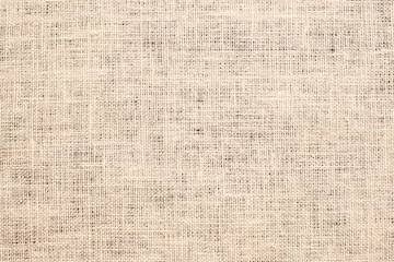 Light brown linen background Weaving Canvas Fabric Texture background. or Natural brown cloth surface .