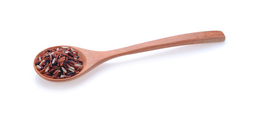 riec on wood spoon on white background.