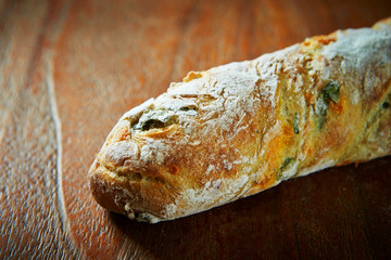 Stick bread on wooden background 