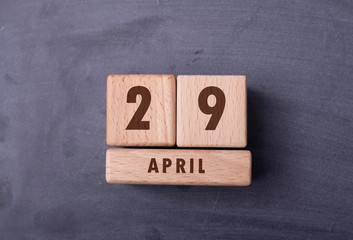 April 29 written with wooden blocks
