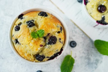 Homemade Blueberry Muffin for one baked in a ramekin, selective focus