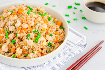 Chinese Shrimp Fried Rice with Chopsticks, Close Up Photo on White Background
