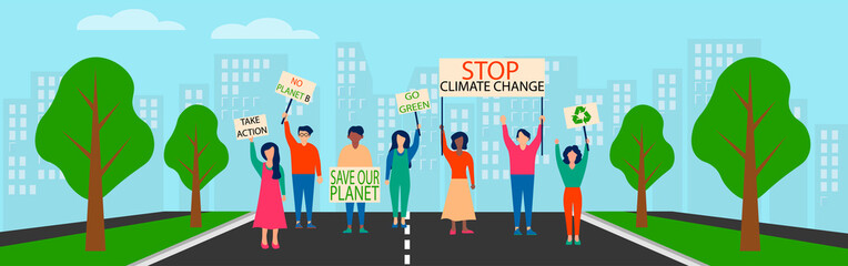 Environmental activists are focusing on climate change. Protest action against climate change. Eco-activists protesting with shawls at a demonstration for saving planet Earth. Ecology concept.