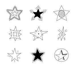 Set of hand drawn doodle stars. Sketch group of black cartoon stars isolated on white background