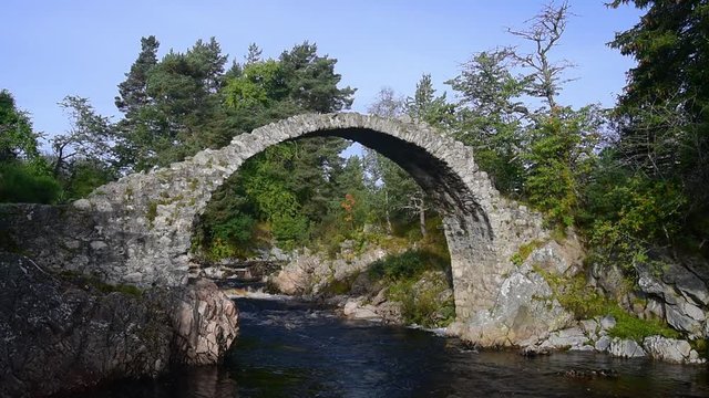 Pack Horse Funeral bridge over the river Dulnain, the oldest stone bridge in the Highlands at Carrbridge, Scotland, UK