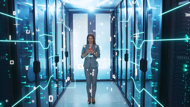 IT Administrator Woman Activating Modern Data Center with Digital Data Flow Moving Through Server Racks. Digitalization of Information. Looped 3D Animation of Graphic Circuit Lines, Numbers and