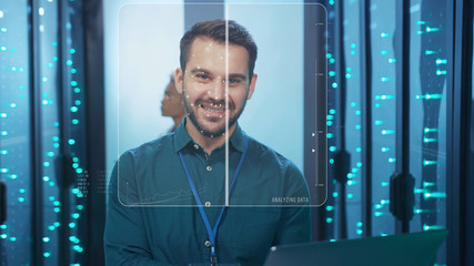Face Detection. Face ID. Technological Animated Facial Recognition. Futuristic 3D Biometric Facial Scan of Cheerful Data Center Engineer Coworking in Server Room. Man Identification. Personal Safety
