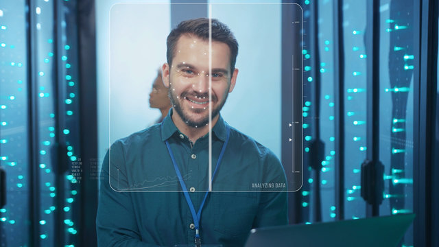 Face Detection. Face ID. Technological Animated Facial Recognition. Futuristic 3D Biometric Facial Scan of Cheerful Data Center Engineer Coworking in Server Room. Man Identification. Personal Safety
