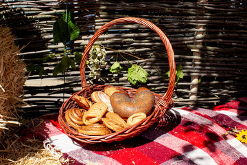 Wicker basket with bread rolls