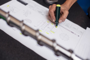 Technician is making a quality control on the product