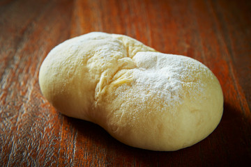 soft bread on wooden background 