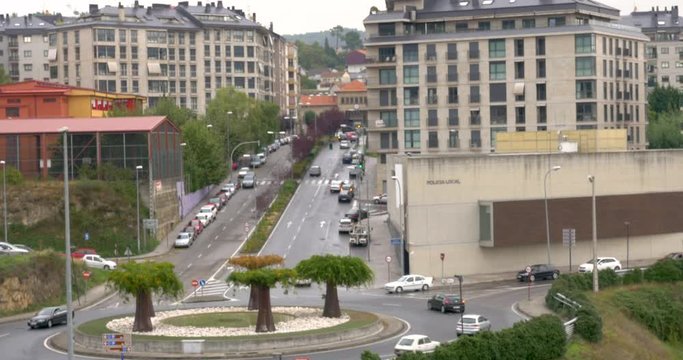 382 Traffic going around roundabout into downtown Ourense, Spain