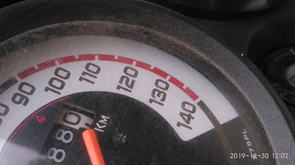 speedometer on black background