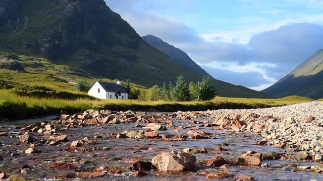 The remote Lagangarbh Hut along River Coupall in front of Buachaille Etive Mor in Glen Coe, Scottish Highlands, Scotland
