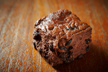Chocolate chip scone on wooden background 