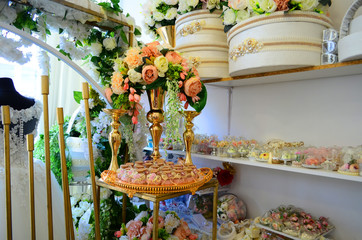 Wedding decor beige bonbonniere in a white basket