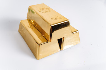 Gold bars of 1 kg or 1000 grams. Gold bars are on the table.