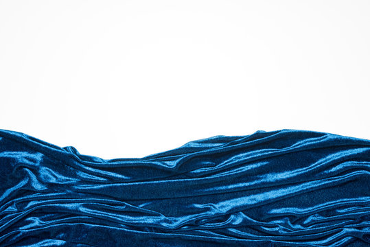Top view of blue velour cloth isolated on white