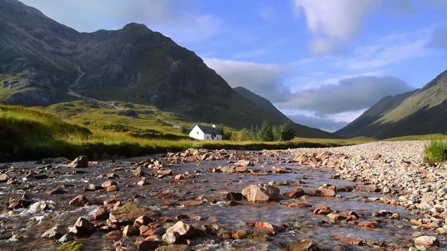 The remote Lagangarbh Hut along River Coupall in front of Buachaille Etive Mor in Glen Coe, Scottish Highlands, Scotland