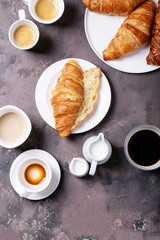 Fresh coffee with croissant